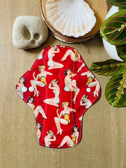 Heavy flow or night time sanitary napkin