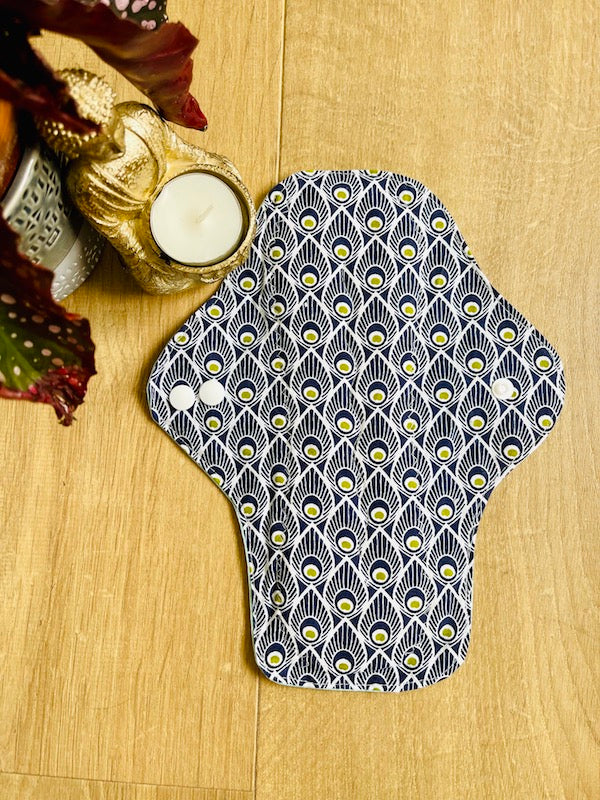 Heavy flow or night time sanitary napkin