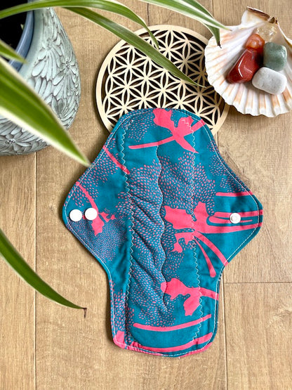 Heavy flow or night time sanitary napkin