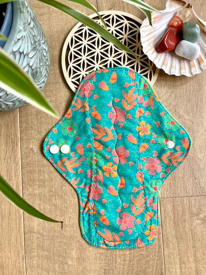 Heavy flow or night time sanitary napkin