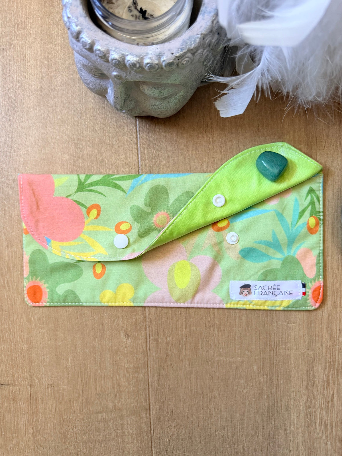 Pochette imperméable Taille L motif printanier fond vert clair